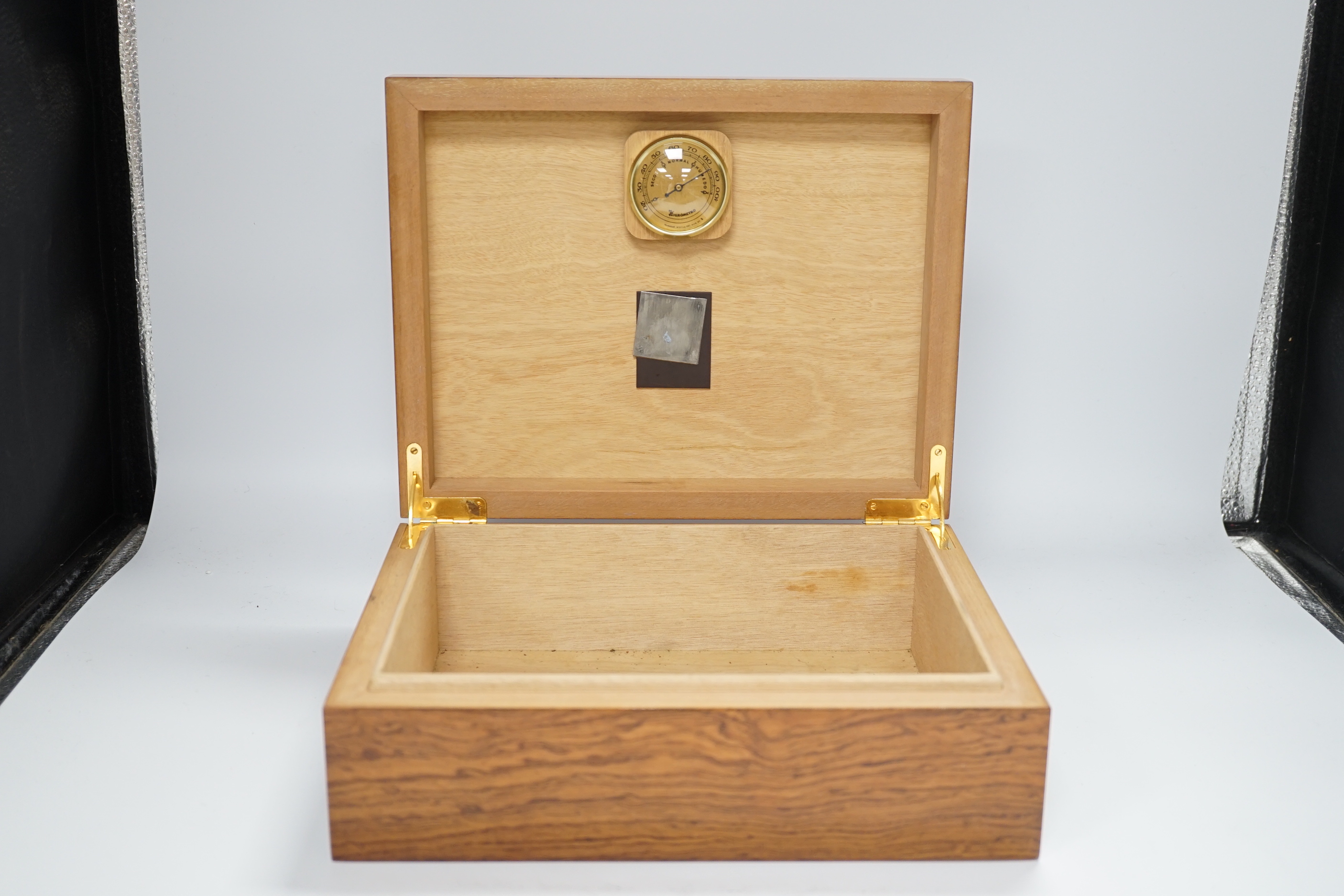 A modern wooden humidor with inset humidity measure, 29cm x 23cm x 9.5cm